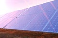 3D rendering solar power generation technology. Alternative energy. Solar battery panel modules with scenic sunset with Royalty Free Stock Photo