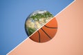 3d rendering of a sphere divided in two with a diagonal line into planet Earth and a basketball.