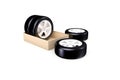 3D Rendering of Car Tire in Shopping Order Box on White