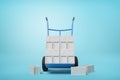 3d rendering of stack of grey hollow bricks on blue hand truck with several bricks lying on ground on light-blue