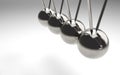 3d rendering. swinging pendulum group on gray background. Royalty Free Stock Photo