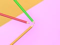 3d rendering of three coloured pencils on multicoloured background, back to school concept