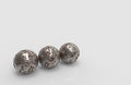 3d rendering. Three old rusty metal sphere ball on gray background.