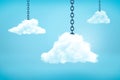 3d rendering of three white fluffy clouds hanging on metal chains in the blue sky. Royalty Free Stock Photo