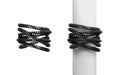 3d rendering of two sets of black messy phone cables wound around a post and around empty space.