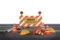 Under construction sign with barrier and cones Royalty Free Stock Photo