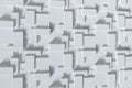 3D rendering, wall of chaotic jumble of white rectangular blocks of various sizes, arranged at different heights.