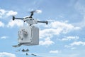3d rendering of white drone carrying open bank safe with dollars falling out on blue sky background Royalty Free Stock Photo