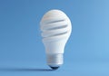 3D Rendering of a White Light Bulb Against a Minimalist Blue Background Royalty Free Stock Photo