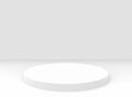 3d rendering. White slim cylinder turn table stage on gray floor with copy space background Royalty Free Stock Photo