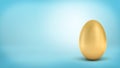 3d rendering of a whole golden egg with metallic reflection on blue background.