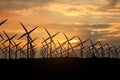 3D rendering of windmills producing engergy in the evening Royalty Free Stock Photo