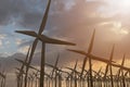 3D rendering of windmills producing engergy in the evening Royalty Free Stock Photo