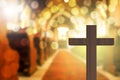 3D rendering of wooden cross in blurred church interior Royalty Free Stock Photo