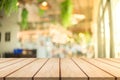 3D Rendering, Wooden top table with bokeh light effect and blur restaurant on background, blur background Royalty Free Stock Photo