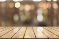 3D Rendering, Wooden top table with bokeh light effect and blur restaurant on background, blur background Royalty Free Stock Photo