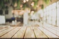 3D Rendering, Wooden top table with bokeh light effect and blur restaurant on background, blur background Royalty Free Stock Photo