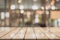 3D Rendering, Wooden top table with bokeh light effect and blur restaurant on background, blur background Royalty Free Stock Photo