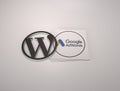 3d rendering of the WordPress and Google AdWords logos against a white background