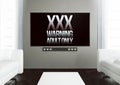 wooden living room with xxx warning at smart tv