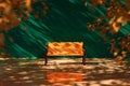 Empty yellow wooden bench in autumn park near green wall Royalty Free Stock Photo