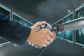 3D robot hand and person shaking hands against background with medical interfaces Royalty Free Stock Photo