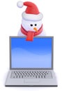 3d Santa snowman looks over a laptop pc