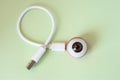 3D shape of eye ball with connected by charging cord, cable or for connecting with other devices. Concept of technology bionic or Royalty Free Stock Photo