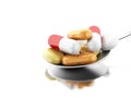 3d Spoon full of colorful pills and capsule Royalty Free Stock Photo