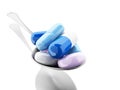 3d Spoon full of colorful pills and capsule Royalty Free Stock Photo