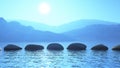 3D stepping stones in the ocean against a mountain landscape Royalty Free Stock Photo