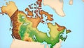 3D-style map of Canada showing realistic terrain with elevation, rivers, and mountain ranges Royalty Free Stock Photo