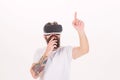 3d technology, virtual reality, entertainment, cyberspace and people concept - happy young man with virtual reality Royalty Free Stock Photo