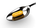 3d vitamin D pill on spoon over white