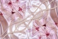 3D wallpaper texture, branch blossoming apple tree and pearls on peach silk background