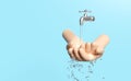 3d washing two hands under the water tap isolated on blue background. hands holding clean water drop, save water, world water day Royalty Free Stock Photo