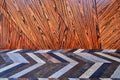 3D wood wall panels with multicolored carpet. Wood veneer wall panels with geometric shapes Royalty Free Stock Photo