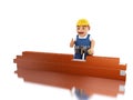 3d Worker with a trowel building brick wall Royalty Free Stock Photo