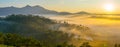 Da lat, lam dong, viet nam- feb 12, 2017: beautyful landscape of da lat city, a small vietnamese pagoda in fog and the pine hill Royalty Free Stock Photo