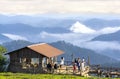 The landscape in the morning valley by the wooden bridge attracts many tourist couples to take wedding Royalty Free Stock Photo