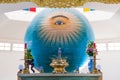 Da Nang, Vietnam: a sphere with Left Eye of God and the altar in Trung Hung Buu Toa, a Caodaist temple Royalty Free Stock Photo