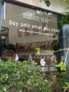 Da nang, Vietnam - May,12, 2025: A storefront window features a clear message about sustainability. The text promotes a zero-waste Royalty Free Stock Photo
