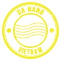 DA NANG - VIETNAM, words written on yellow postal stamp Royalty Free Stock Photo