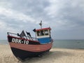 Dabki, Poland 2023 - small fishing boat docked on the beach