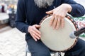 Dabyl. Kazakh folk musical instrument. man& x27;s hands playing the double