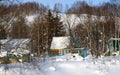 Dacha-lodges in snowdrift. The Sakhalin. Royalty Free Stock Photo