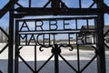 Dachau, Germany : April 2, 2019 - view of the main gate at the entrance to Dachau Concentration Camp Memorial Site. work sets you Royalty Free Stock Photo