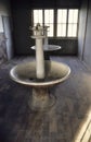 Dachau, Germany. Inside washing room with large circular sinks