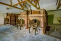 Dachau, Germany - July 30, 2015: Brick ovens inside crematorium building showing gruesome reality of what happened at