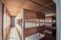 Dachau, Germany - July 30, 2015: Inside sleeping quarters with wooden bunk beds showing prisoners terrible living conditions Royalty Free Stock Photo